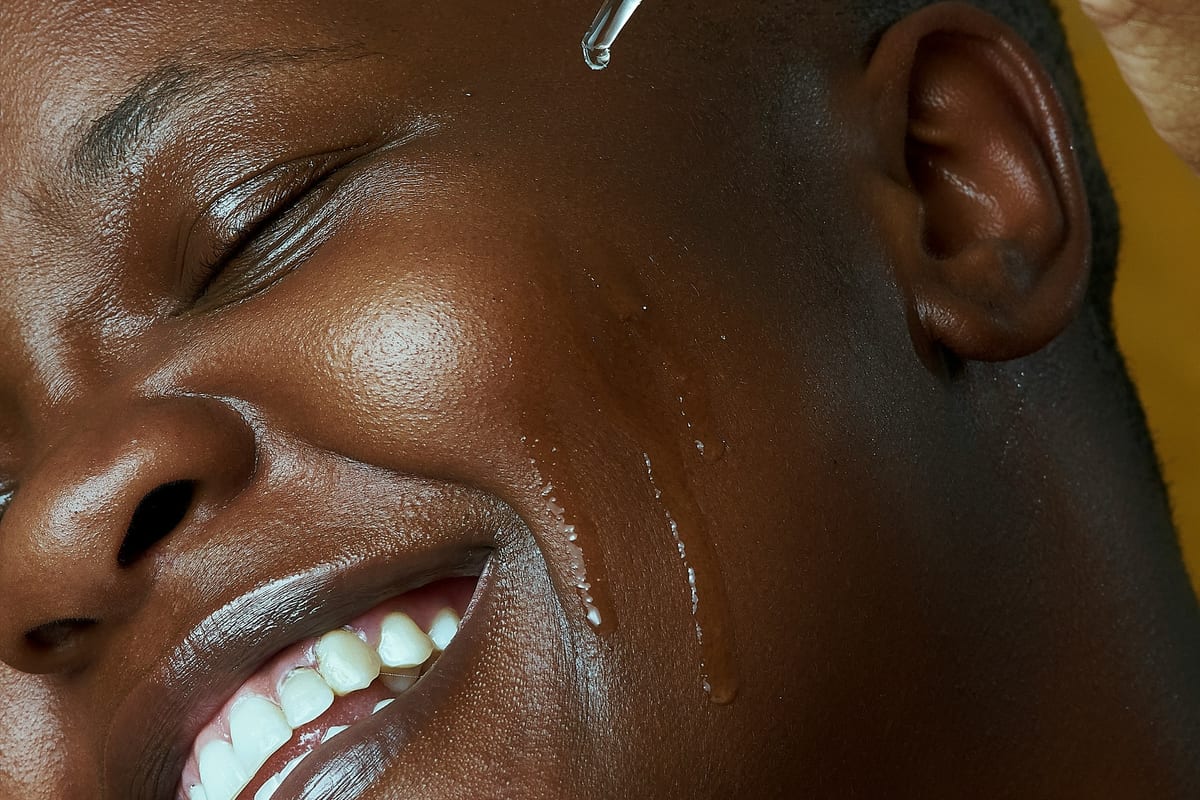 Morning skincare ritual — warm light, clean skin